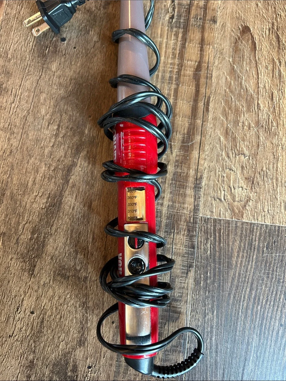 Conair tapered curling wand.